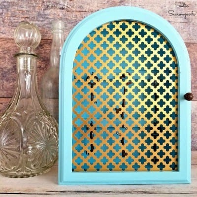 Cabinet Makeover Using Decorative Metal Insert