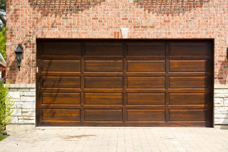 dark wood painted metal garage door