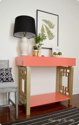 Coral and Gold Fretwork Console Table