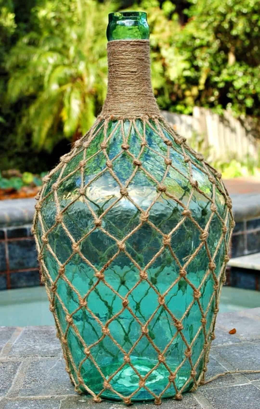 DIY Knotted Jute Bottle on stone