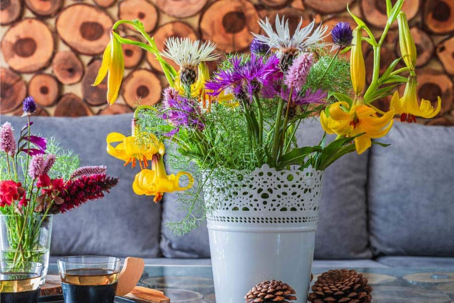 festive neature flowers in tin can